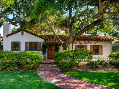 Shaded front yard with large shade tree